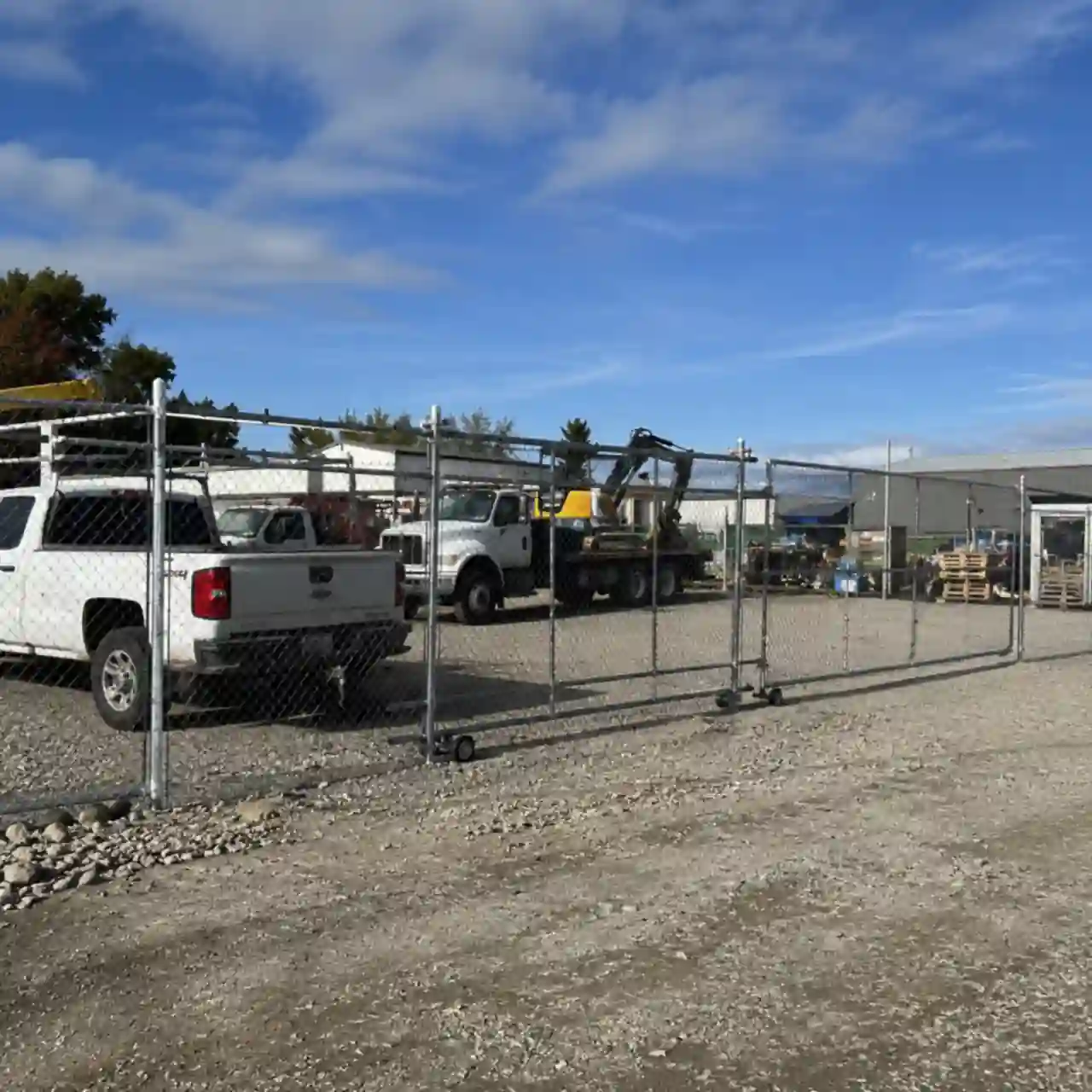 Burley Idaho Fence Pros crew installing commercial chain link fencing near Burley