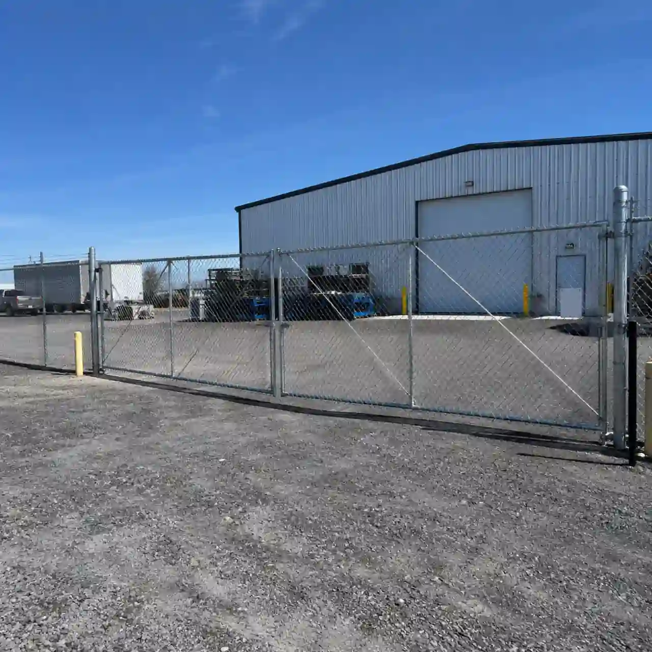 Burley Idaho Fence Pros crew installing commercial fencing near Burley